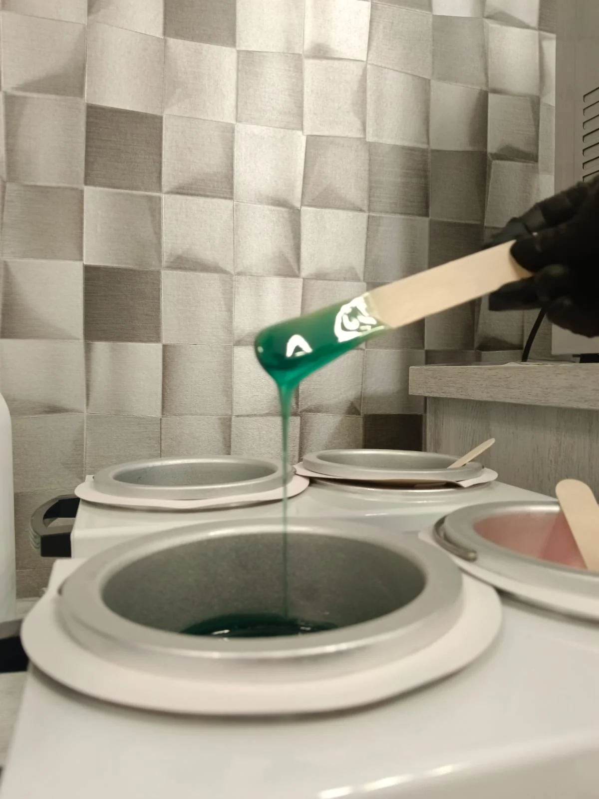 Fresh professional wax being prepared at the studio